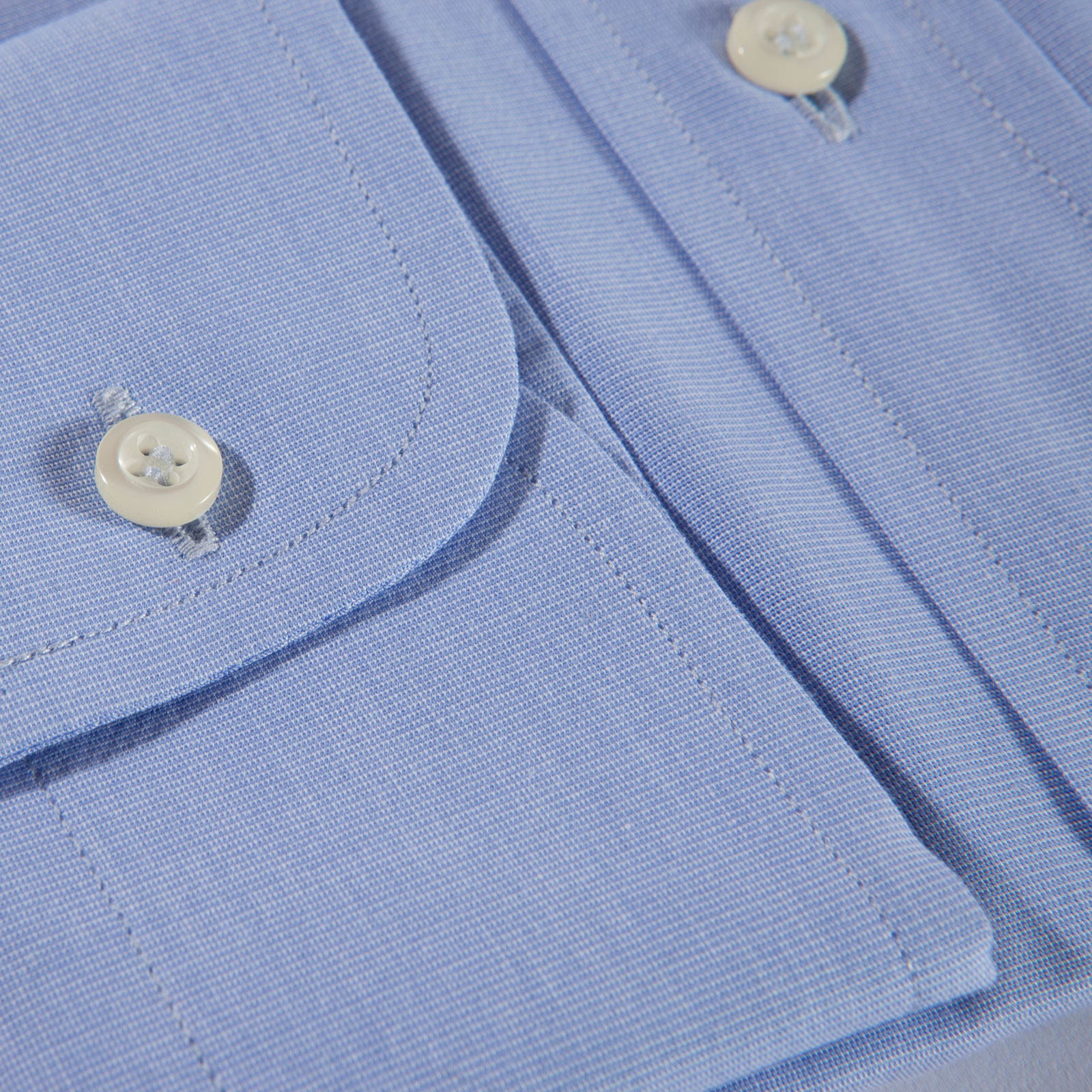 Dettaglio bottoni azzurro